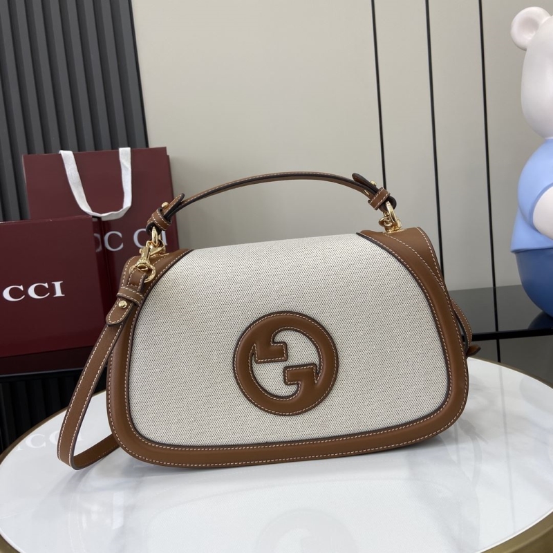 G*u*i top handle bags